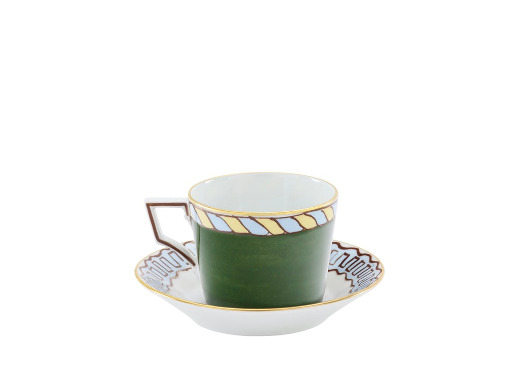 Side view of Luna tea cup and saucer showcasing green exterior, gold trim, and angular handle on white background