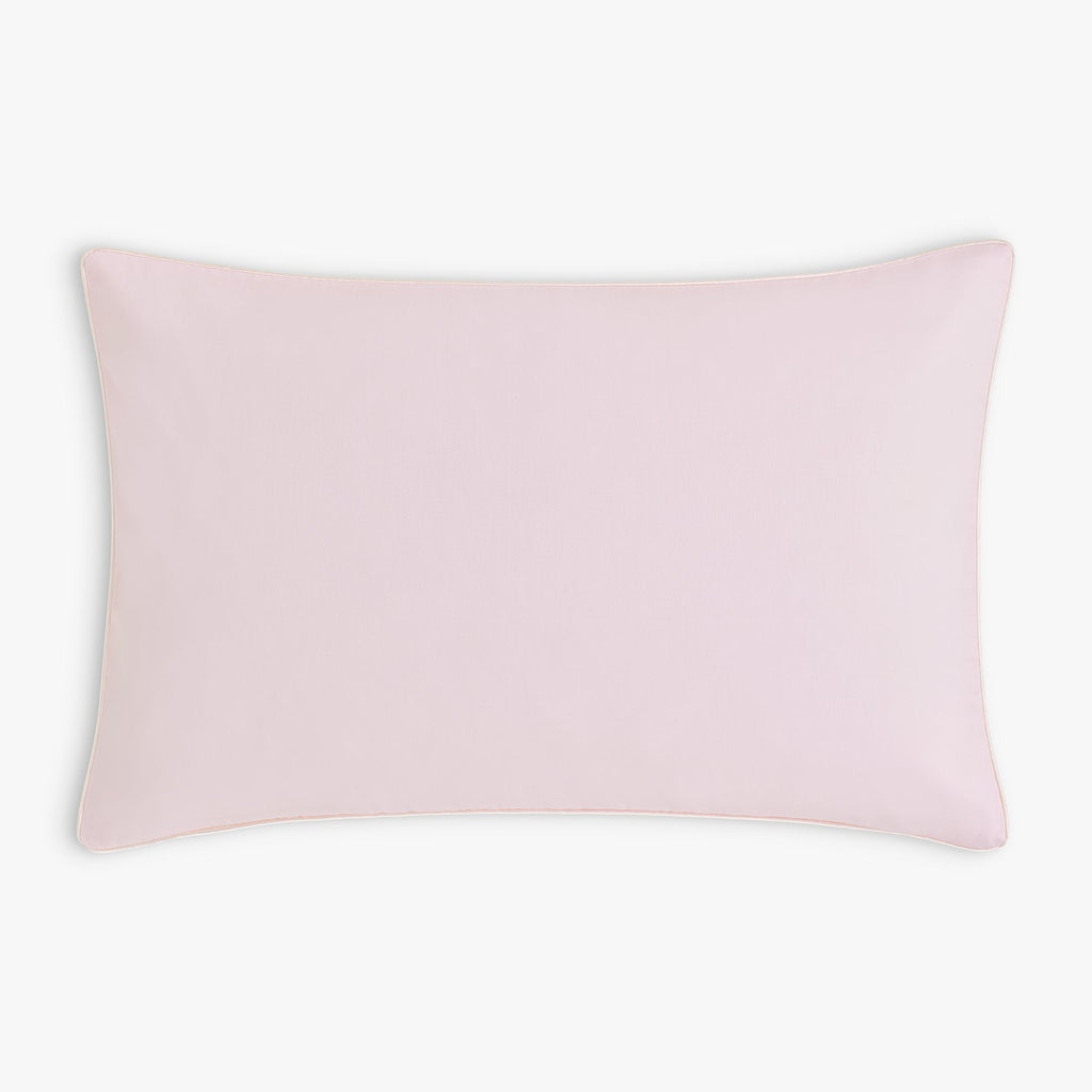 Backside of toddler pillow, solid pink. 