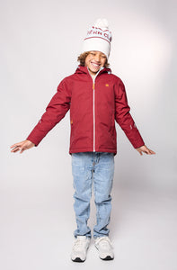 Kids red winter coat for skiing and snow play, with warm insulation and waterproof outer shell for full cold weather protection and hood