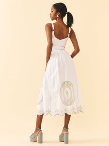 Back view of Katherine Dress in White Whimsy showing smocked back, adjustable straps and embroidered A-line skirt