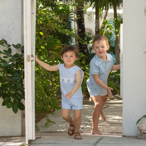 Henry Duvall Jennings Jon Jon in Bailey’s Bay Blue cotton with hand-smocked sailboats, classic heirloom baby boy summer outfit
