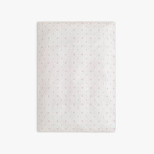 Baby duvet in Ditsy Floral in Pink, laid flat. 
