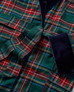 Close-up of men’s Kensington Tartan robe showcasing green and red plaid fabric with navy velvet collar and cuff