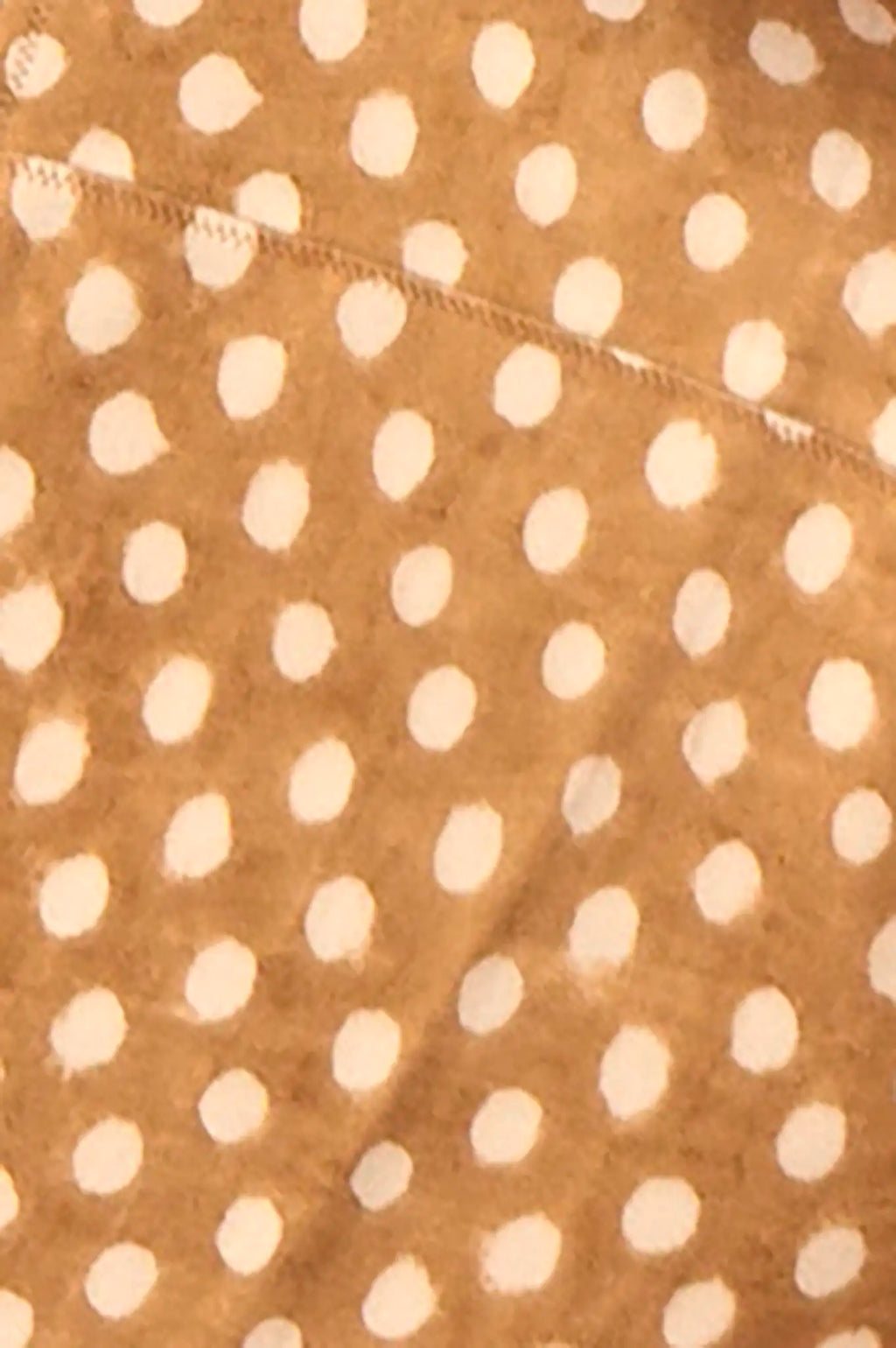 Close up of the Bermuda Bikini Bottom in Coconut Sand Dot.