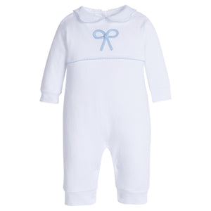 Little English traditional children's clothing.  Baby girl's white knit peter pan playsuit romper with blue bow crochet for Spring.  Gift clothing for baby girl