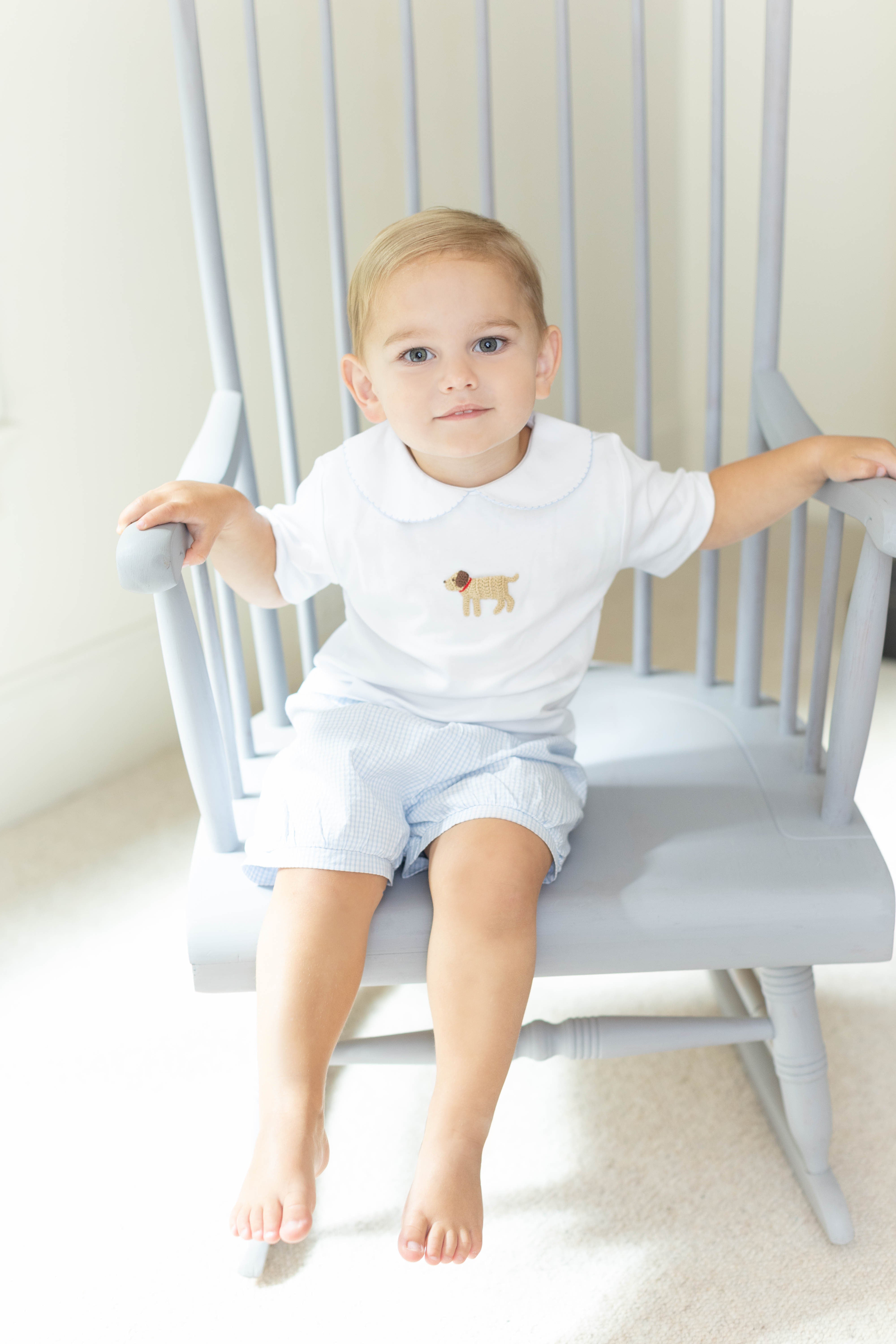 Little English traditional children's clothing.  Toddler boy's white knit peter pan shirt with dog crochet for Spring.  Gift clothing for toddler boy