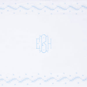 Little English classic nursery goods for baby, white crib sheet with simple light blue embroidery along the edges for baby
