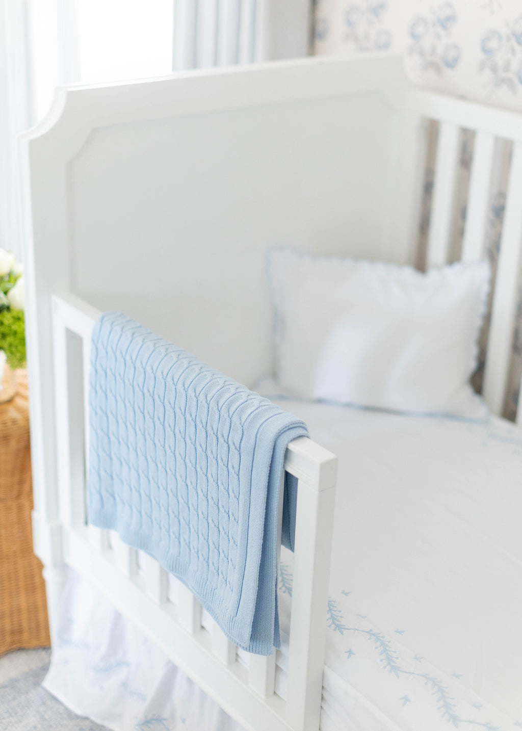 Little English classic nursery goods for baby, white crib sheet with simple light blue embroidery along the edges for baby