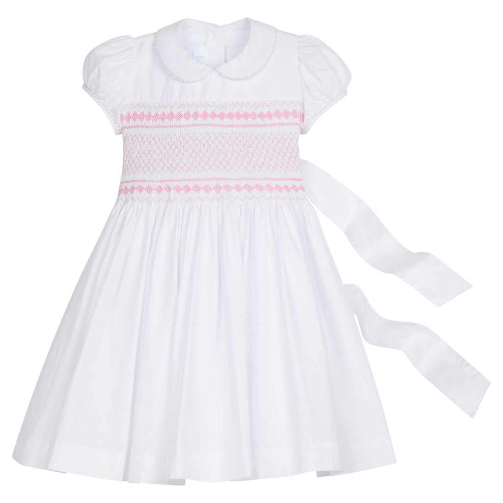 Little English traditional girl's clothing, classic smocked dress for toddler girls with peter pan collar and sash, little girl's flower girl dress with light pink smocking