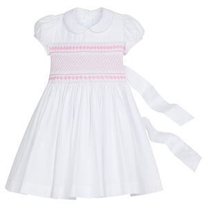 Little English traditional girl's clothing, classic smocked dress for toddler girls with peter pan collar and sash, little girl's flower girl dress with light pink smocking