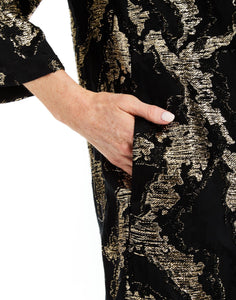 Ines Caftan Mini Dress in Black/Gold pocket detail – metallic lurex cocktail shift dress with djellaba collar, bell sleeves, and side seam pockets by Mestiza New York.