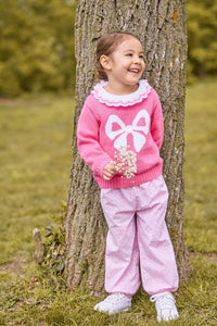 little english classic children's clothing hot pink sweater with white bow motif, Double london blouse with hot pink trim on collar, banded bow pant in pink vinings pattern, fall outfit for girls