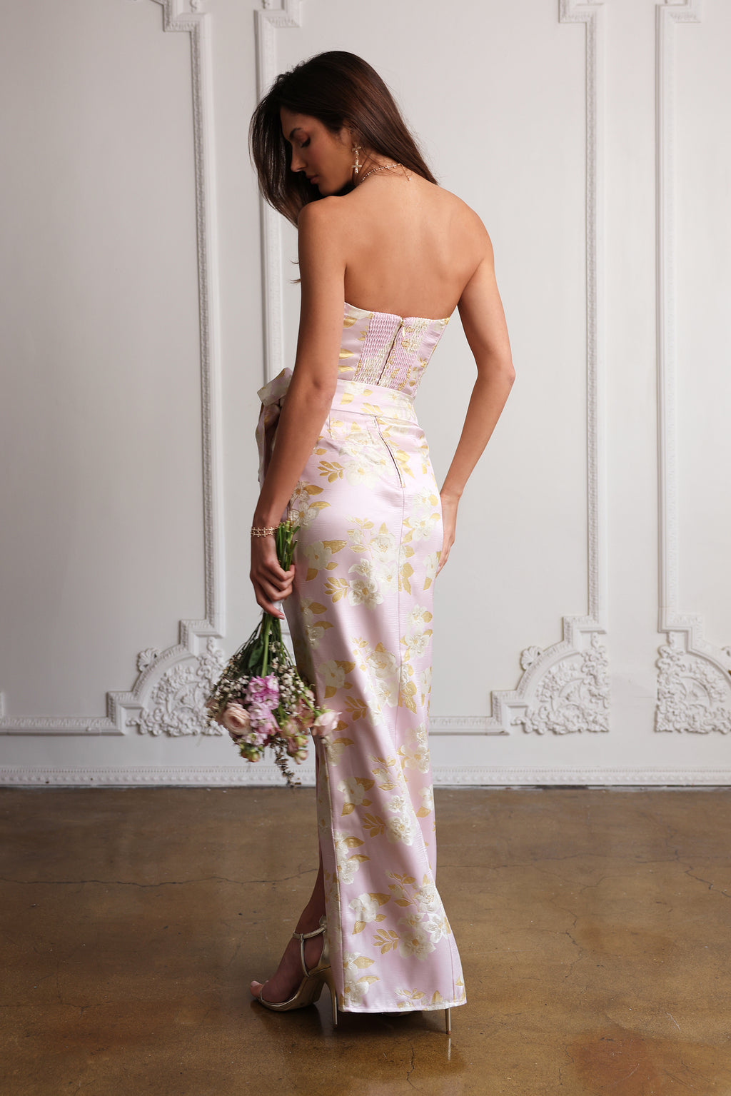Back view of June Dress in light lilac baroque floral, strapless corset and fitted column skirt with gold pattern