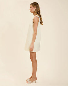 Juniper Shift Mini Dress in Ivory cotton poplin with 3D floral embroidered appliqué, sleeveless shift silhouette, crew neckline, and hidden pockets.