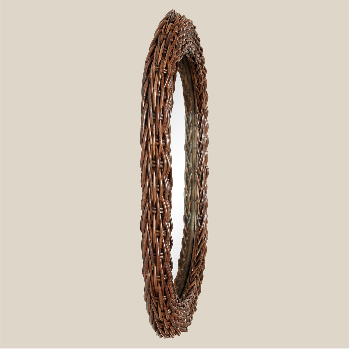 side view of brown rattan mirror