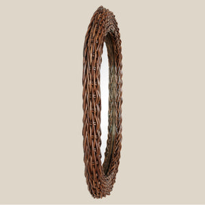 side view of brown rattan mirror