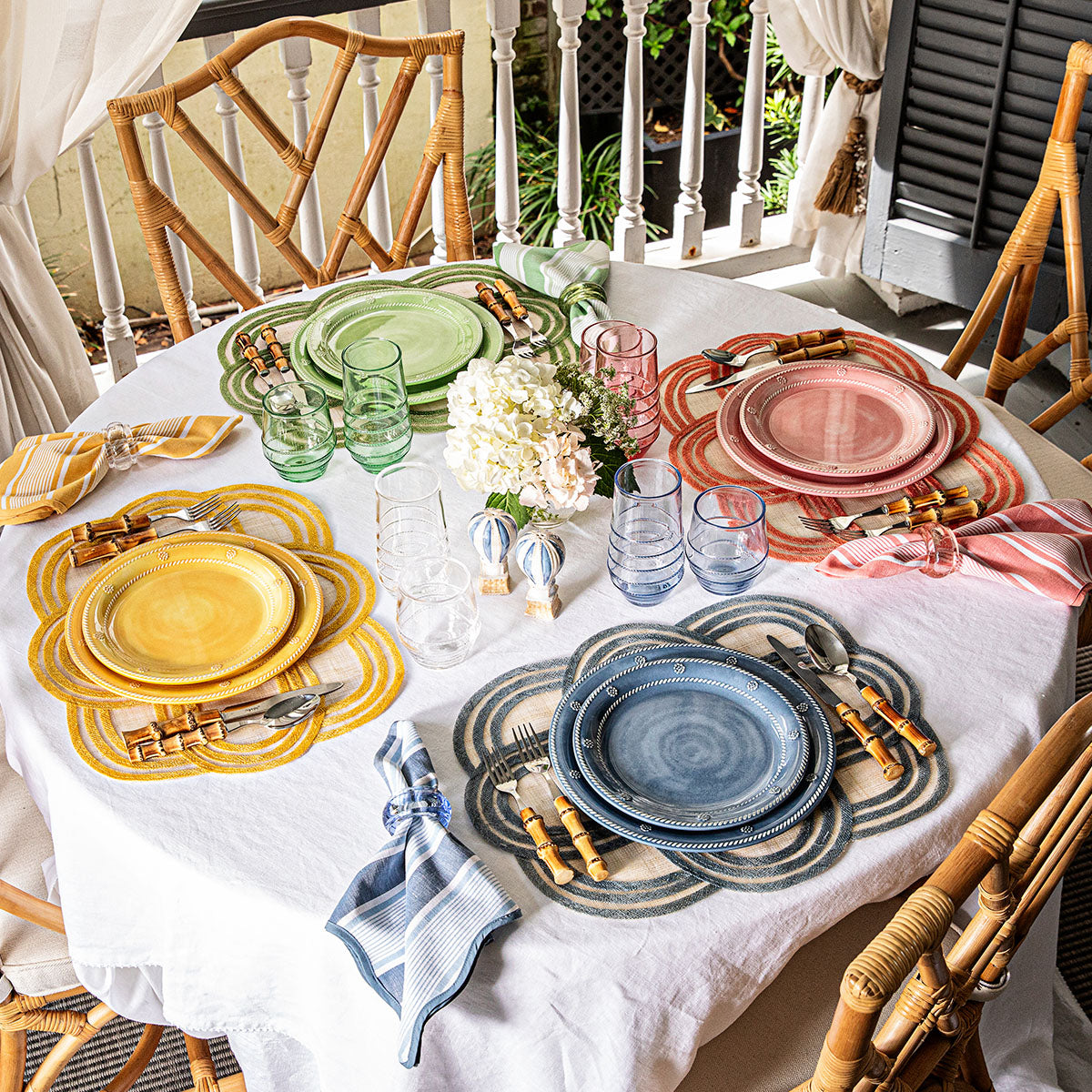 Overhead view of seagrass Berry & Thread melamine dessert plate showing beaded rim and embossed motif on a white tablecloth