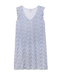 The Womens Pima Harper Nightgown in Fleur dAzur by Petite Plume features a vintage-inspired blue and white floral print. With its V-neckline and soft, flowy fabric, this piece combines casual comfort with timeless charm.