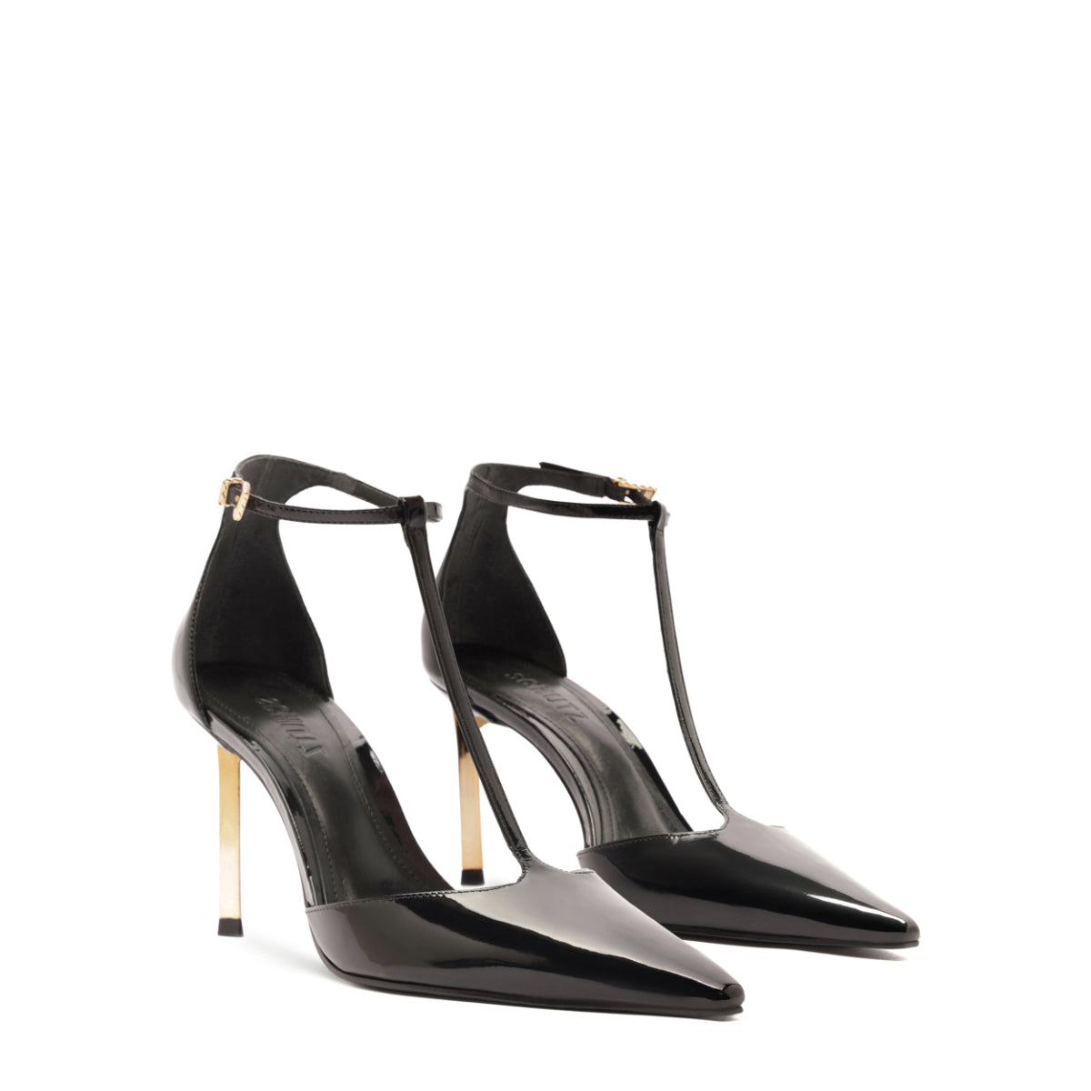 Three-quarter view of Allure T patent pump in black showcasing pointed toe, T-strap and gold stiletto heel on white background