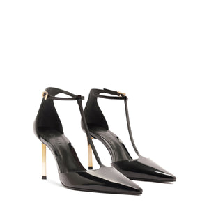 Three-quarter view of Allure T patent pump in black showcasing pointed toe, T-strap and gold stiletto heel on white background