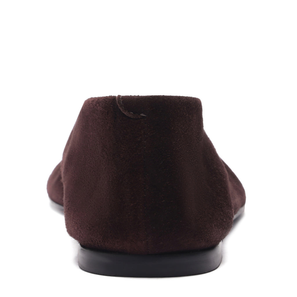 Rear view of Courtney suede flat in seal brown showcasing soft suede upper and low heel on white background