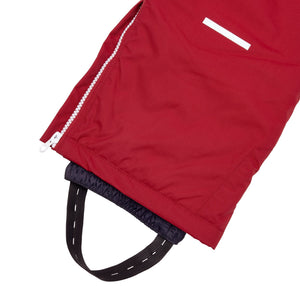 Kids red snow bib pants with adjustable straps, waterproof fabric, and reinforced knees for winter play and ski