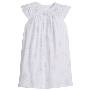 Little English traditional children's clothing.  Smocked pima cotton knit dress with bow and flower print for little girls for Spring