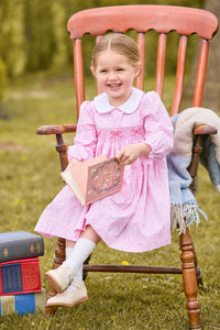 little english classic children's clothing girls pink and white floral long sleeve dress with peter pan collar, chest smocking, and bow embroidery for fall 