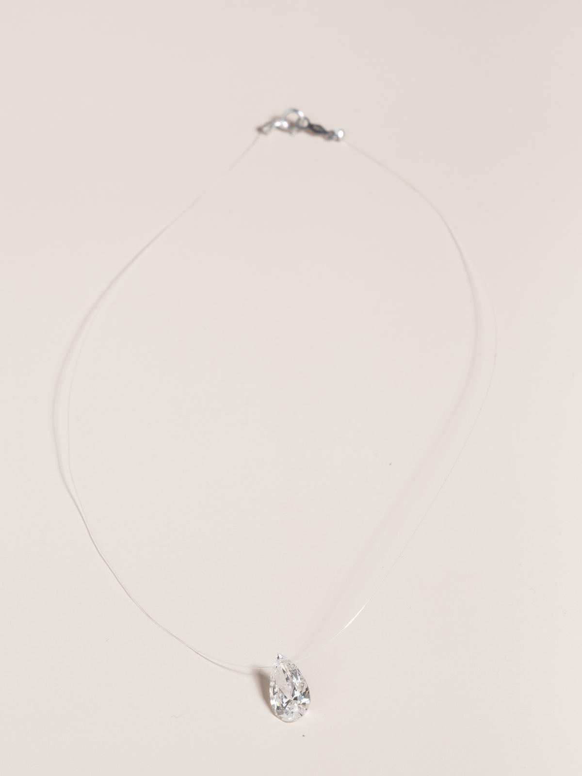 Pear Shaped “Floating” Diamond Pendant