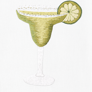 a margarita cocktail with a salted rim and lime slice
