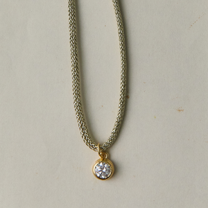 The Bezel Charm on Gold Lurex Cord