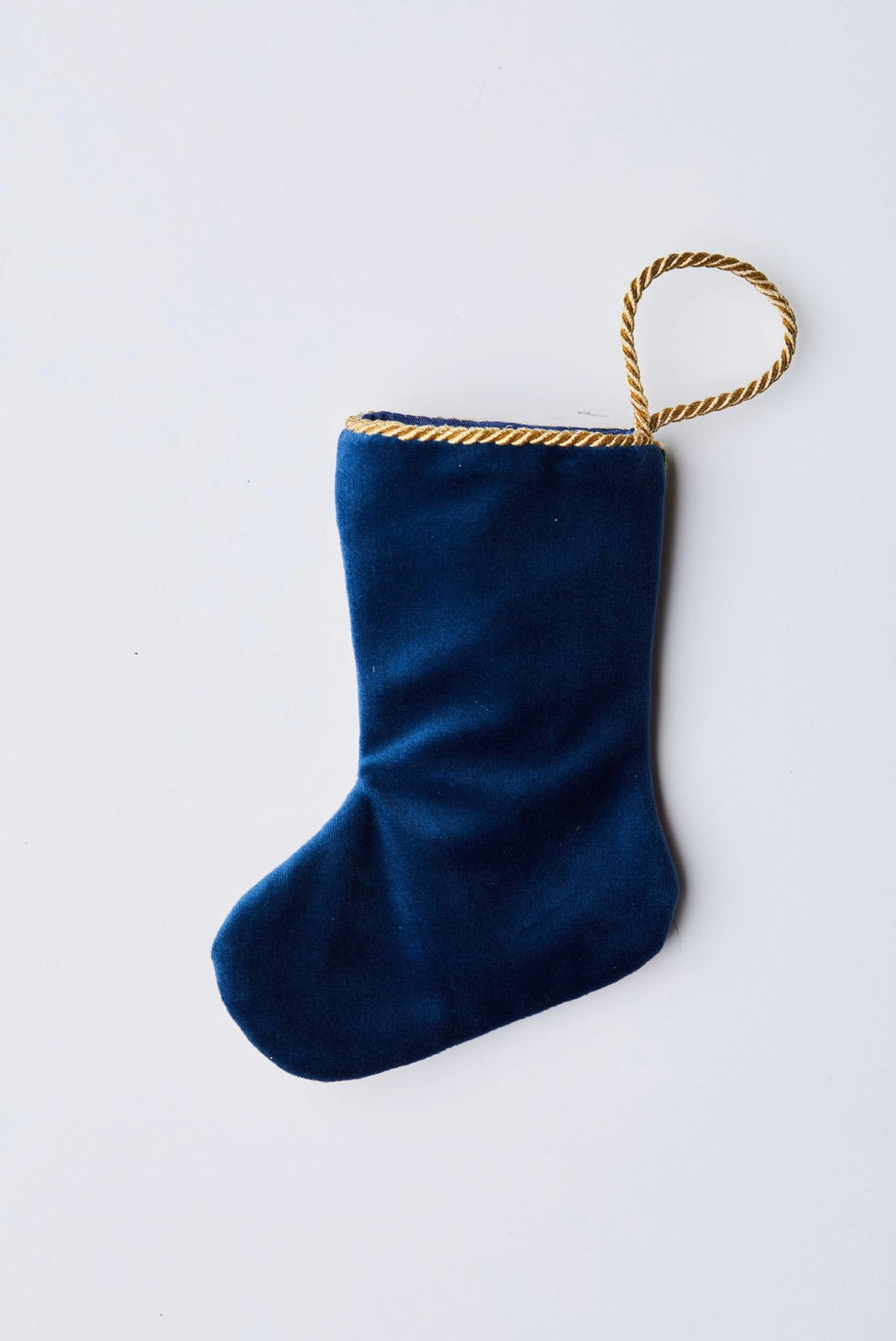 Back view of Bonne Nuit Santa in Paris Bauble Stockings with solid navy blue velvet backing