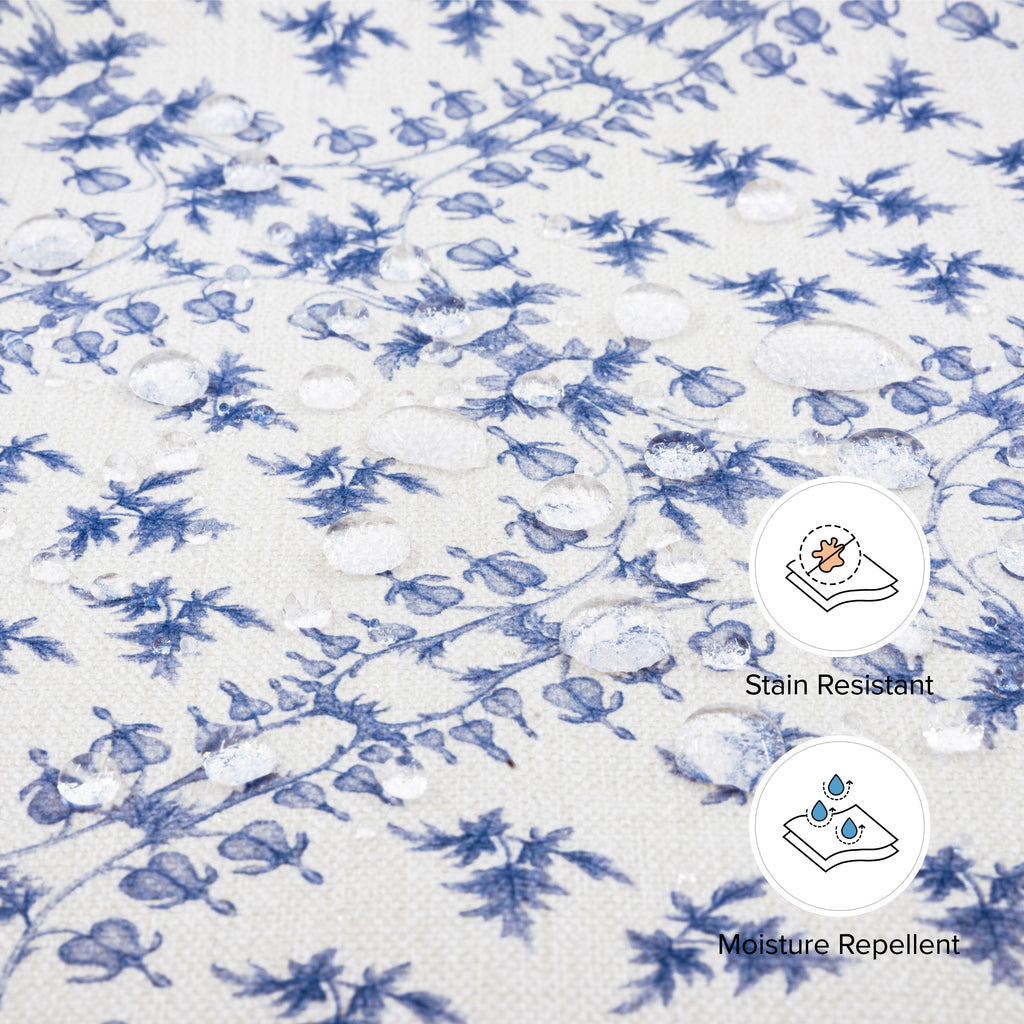 Close-up of Crawford glider Blue Lattice fabric with water beading and icons Stain Resistant and Moisture Repellent