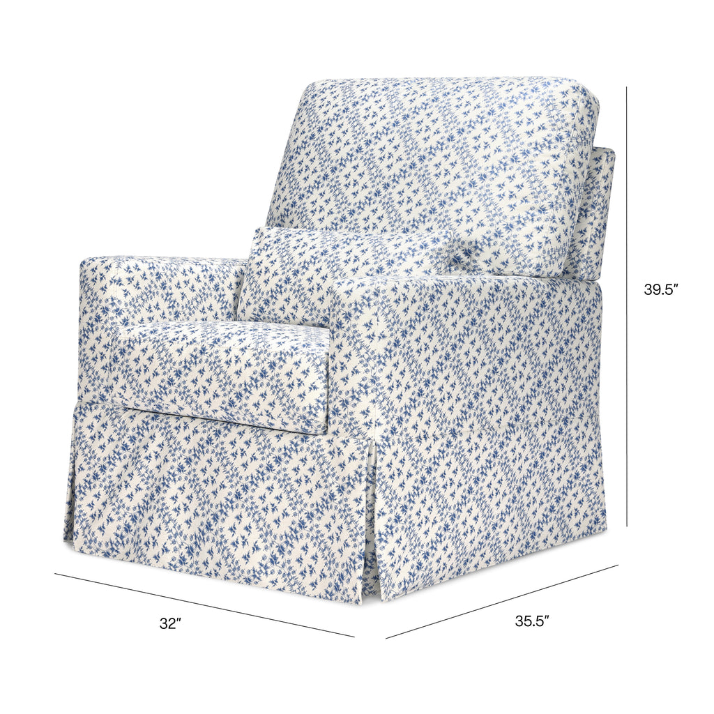 3/4 View of Sarah Flint x Namesake Crawford swivel glider in blue lattice showing pillowback, skirt, dims 32 x 35.5 x 39.5 in