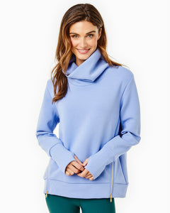 Model is wearing the Everyday Pullover in Violet and the Everyday Legging in Ivy